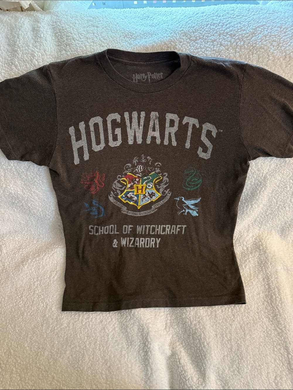Warner Bros. Black Hogwarts Crest Graphic Tee with Colorful House Accents